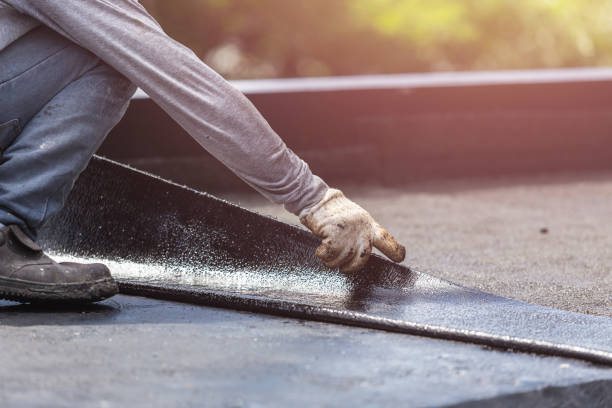 Professional Basement Waterproofing technician working in Markleville, IN